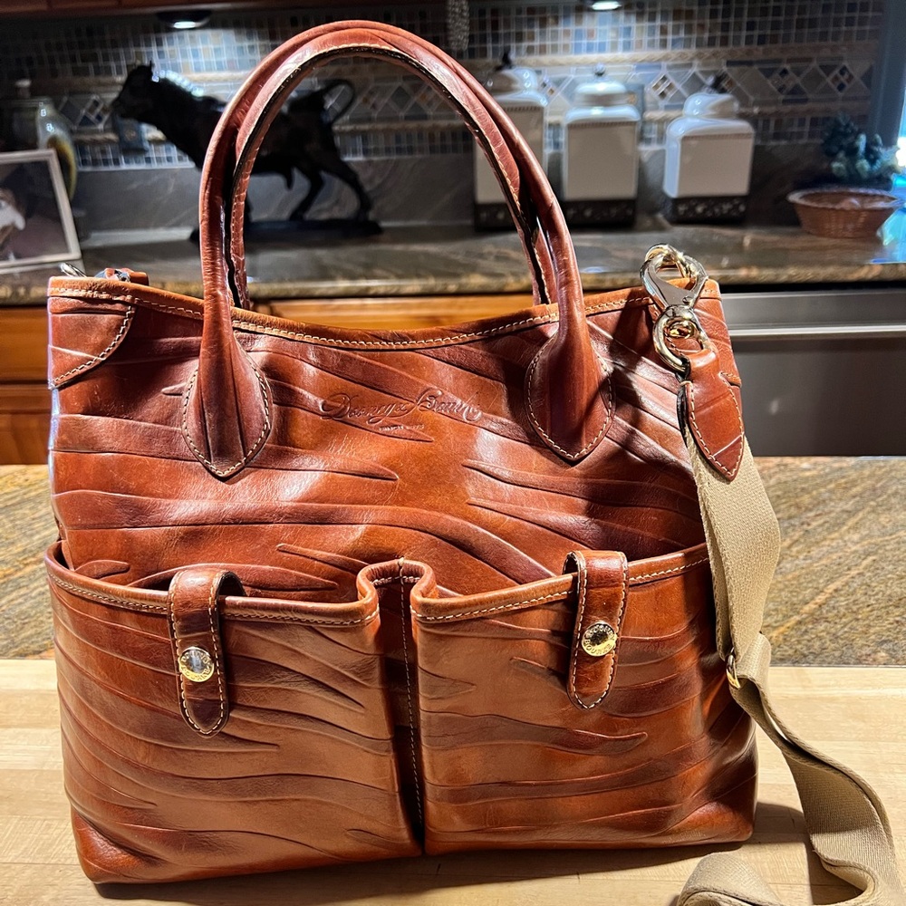 Outstanding Dooney and Bourke Zebra/Tiger pattern Leather Handbag.